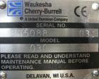 Used Waukesha Cherry Burrell positive displacement pump, model 030, 316 stainless steel. Approximate capacity 36 gallons per minute at 600 rpm. 1 1/2