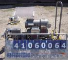 Used Waukesha Rotary Positive Displacement Pump, Model 030, 316 Stainless Steel. Approximately 36 gallons per minute at 100 psi at 600 rpm capacity, .06 gallon displacement per revolution. 1 1/2