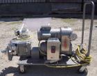 Used Waukesha Rotary Positive Displacement Pump, Model 030, 316 Stainless Steel. Approximately 36 gallons per minute at 100 psi at 600 rpm capacity, .06 gallon displacement per revolution. 1 1/2