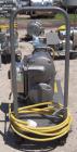 Used Waukesha Rotary Positive Displacement Pump, Model 030, 316 Stainless Steel. Approximately 36 gallons per minute at 100 psi at 600 rpm capacity, .06 gallon displacement per revolution. 1 1/2