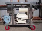 Used Waukesha Rotary Positive Displacement Pump, model 030, 316 stainless steel. Approximately 36 gallons per minute at 100 psi at 600 rpm capacity, .06 gallon displacement per revolution. 1 1/2