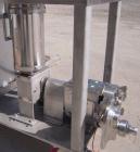 Used Waukesha Rotary Positive Displacement Pump, Model 030, 316 Stainless Steel. Approximately 36 gallons per minute at 100 psi at 600 rpm capacity, .06 gallon displacement per revolution. Stainless ...