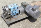 Used Waukesha Rotary Positive Displacement Pump, Model 030, 316 Stainless Steel. Approximately 36 gallons per minute at 100 psi at 600 rpm capacity, .06 gallon displacement per revolution. 2