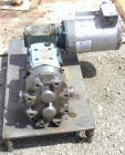 Used Waukesha Rotary Positive Displacement Pump, Model 030, 316 Stainless Steel. Approximately 36 gallons per minute at 100 psi at 600 rpm capacity, .06 gallon displacement per revolution. 2