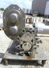Used Waukesha Rotary Positive Displacement Pump, Model 030, 316 Stainless Steel. Approximately 36 gallons per minute at 100 psi at 600 rpm capacity, .06 gallon displacement per revolution. 2