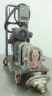 Used Waukesha Rotary Positive Displacement Pump, Model 030, 316 Stainless Steel. Approximately 36 gallons per minute at 100 psi at 600 rpm capacity, (.06) gallon displacement per revolution. 1-1/2