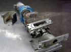 Used Waukesha Rectangular Flange Universal Rotary Positive Displacement Pump, Model 034, 316 Stainless Steel. Approximately 24 gallons per minute at 200 psi at 400 rpm, (0.060) gallon displacement pe...