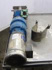 Used Waukesha Rectangular Flange Universal Rotary Positive Displacement Pump, Model 034, 316 Stainless Steel. Approximately 24 gallons per minute at 200 psi at 400 rpm, (0.060) gallon displacement pe...