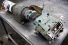 Used Waukesha Rectangular Flange Universal Rotary Positive Displacement Pump, Model 034, 316 Stainless Steel. Approximately 24 gallons per minute at 200 psi at 400 rpm, 0.060 gallon displacement per ...