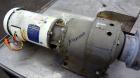 Used Waukesha Rectangular Flange Universal Rotary Positive Displacement Pump, Model 034, 316 Stainless Steel. Approximately 24 gallons per minute at 200 psi at 400 rpm, 0.060 gallon displacement per ...