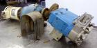 Used Waukesha Rectangular Flange Universal Rotary Positive Displacement Pump, Model 034, 316 Stainless Steel. Approximately 24 gallons per minute at 200 psi at 400 rpm, 0.060 gallon displacement per ...