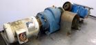 Used Waukesha Rectangular Flange Universal Rotary Positive Displacement Pump, Model 034, 316 Stainless Steel. Approximately 24 gallons per minute at 200 psi at 400 rpm, 0.060 gallon displacement per ...