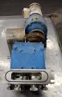 Used Waukesha Rectangular Flange Universal Rotary Positive Displacement Pump, Model 034, 316 Stainless Steel. Approximately 24 gallons per minute at 200 psi at 400 rpm, 0.060 gallon displacement per ...