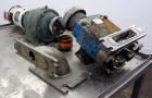 Used Waukesha Rectangular Flange Universal Rotary Positive Displacement Pump, Model 034, 316 Stainless Steel. Approximately 24 gallons per minute at 200 psi at 400 rpm, 0.060 gallon displacement per ...
