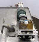 Used Waukesha Rectangular Flange Universal Rotary Positive Displacement Pump, Model 034, 316 Stainless Steel. Approximately 24 gallons per minute at 200 psi at 400 rpm, 0.060 gallon displacement per ...