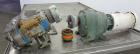 Used Waukesha Rectangular Flange Universal Rotary Positive Displacement Pump, Model 034, 316 Stainless Steel. Approximately 24 gallons per minute at 200 psi at 400 rpm, 0.060 gallon displacement per ...
