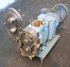 Used Waukesha Rotary Positive Displacement Pump, Model 060, 316 Stainless Steel. Approximately 90 gallons per minute at 200 psi at 600 rpm. (.153) gallons displacement per revolution. 2-1/2