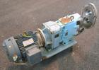 Used Waukesha Rotary Positive Displacement Pump, Model 060, 316 Stainless Steel. Approximately 90 gallons per minute at 200 psi at 600 rpm. (.153) gallons displacement per revolution. 2-1/2