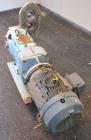 Used Waukesha Rotary Positive Displacement Pump, Model 060, 316 Stainless Steel. Approximately 90 gallons per minute at 200 psi at 600 rpm. (.153) gallons displacement per revolution. 2-1/2