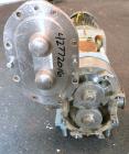 Used Waukesha Rotary Positive Displacement Pump, Model 060, 316 Stainless Steel. Approximately 90 gallons per minute at 200 psi at 600 rpm. (.153) gallons displacement per revolution. 2-1/2