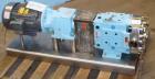 Used Waukesha Universal Rotary Positive Displacement Pump, Model 060, 316 Stainless Steel. Approximately 90 gallons per minute at 200 psi at 600 rpm. 0.153 gallons displacement per revolution. 2-1/2