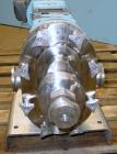 Used Waukesha Universal Rotary Positive Displacement Pump, Model 060, 316 Stainless Steel. Approximately 90 gallons per minute at 200 psi at 600 rpm. 0.153 gallons displacement per revolution. 2-1/2