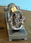 Used Waukesha Universal Rotary Positive Displacement Pump, Model 060, 316 Stainless Steel. Approximately 90 gallons per minute at 200 psi at 600 rpm. 0.153 gallons displacement per revolution. 2-1/2