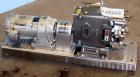 Used Waukesha Universal Rotary Positive Displacement Pump, Model 060, 316 Stainless Steel. Approximately 90 gallons per minute at 200 psi at 600 rpm. 0.153 gallons displacement per revolution. 2-1/2