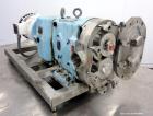 Used Waukesha Positive Displacement Pump, Model 060, 316 Stainless Steel. Rated approximately 90 gallons per minute at 200 psi at 600 rpm, 0.153 gallons displacement per revolution, (2) stainless ste...