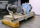 Used Waukesha Universal Rotary Positive Displacement Pump, Model 130, 316 Stainless Steel. Approximately 130 gallons per minute at 100 psi at 600 rpm capacity, 0.254 gallon displacement per revolutio...