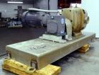 Used Waukesha Universal Rotary Positive Displacement Pump, Model 130, 316 Stainless Steel. Approximately 130 gallons per minute at 100 psi at 600 rpm capacity, 0.254 gallon displacement per revolutio...