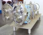 Used Waukesha Universal Rotary Positive Displacement Pump, Model 130, 316 Stainless Steel. Approximately 130 gallons per minute at 100 psi at 600 rpm capacity, 0.254 gallon displacement per revolutio...