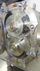Used Waukesha Universal Rotary Positive Displacement Pump, Model 130, 316 Stainless Steel. Approximately 130 gallons per minute at 100 psi at 600 rpm capacity, 0.254 gallon displacement per revolutio...