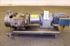 Used Waukesha Universal Rotary Positive Displacement Pump, Model 130, 316 Stainless Steel. Approximately 130 gallons per minute at 100 psi at 600 rpm capacity, (0.254) gallon displacement per revolut...