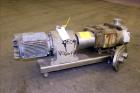 Used Waukesha Universal Rotary Positive Displacement Pump, Model 130, 316 Stainless Steel. Approximately 130 gallons per minute at 100 psi at 600 rpm capacity, (0.254) gallon displacement per revolut...