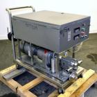 Used Waukesha Rotary Positive Displacement Pump, Model 15, 316 Stainless Steel. Approximately 9 gallons per minute at 200 psi at 700 rpm capacity, (.014) gallon displacement per revolution. 1-1/2