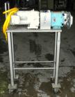 Used Waukesha Rotary Positive Displacement Pump, model 15, 316 stainless steel. Approximate 10 gallons per minute capacity, .013 gallon displacement per revolution. 1-1/2