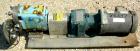 USED: Waukesha universal rotary positive displacement pump, model 015, 316 stainless steel. Approximate 10 gallon per minute capacity, .013 gallon displacement per revolution. (2) 2 lobe stainless st...
