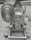 Used Waukesha Universal Rotary Positive Displacement Pump, Model 220, 316 stainless steel. Approximately 260 gallons per minute at 100 psi at 600 rpm capacity, .522 gallon displacement per revolution...