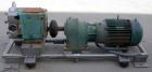 Used Waukesha Universal Rotary Positive Displacement Pump, model 220, 316 stainless steel. Approximately 260 gallons per minute at 100 psi at 600 rpm capacity, .522 gallon displacement per revolution...