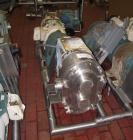 Used Waukesha Rotary Positive Displacement Pump, Model 220, stainless steel. Approximate capacity 260 gallons per minute, .50 gallon displacement per revolution. 3 7/8