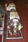 Used Waukesha Rotary Positive Displacement Pump, Model 220, stainless steel. Approximate capacity 260 gallons per minute, .50 gallon displacement per revolution. 3 7/8