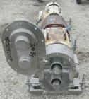 Used Waukesha Universal Rotary Positive Displacement Pump, model 220, 316 stainless steel. Approximately 260 gallons per minute at 100 psi at 600 rpm capacity, .522 gallon displacement per revolution...
