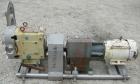 Used Waukesha Universal Rotary Positive Displacement Pump, model 220, 316 stainless steel. Approximately 260 gallons per minute at 100 psi at 600 rpm capacity, .522 gallon displacement per revolution...