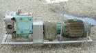 Used Waukesha Rotary Positive Displacement Pump, Model 220, 316 stainless steel. Approximate capacity 260 gallons per minute, .50 gallon displacement per revolution. 3 7/8