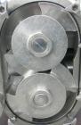 Used Waukesha Universal Rotary Positive Displacement Pump, model 220, 17-4 PH stainless steel. Approximately 260 gallons per minute at 100 psi at 600 rpm capacity, .522 gallon displacement per revolu...