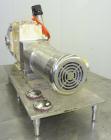 Used Waukesha Universal Rotary Positive Displacement Pump, Model 220, 316 Stainless Steel. Approximately 260 gallons per minute at 100 psi at 600 rpm capacity, (0.522) gallon displacement per revolut...