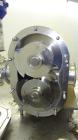 Used Waukesha Universal Rotary Positive Displacement Pump, Model 220, 316 Stainless Steel. Approximately 260 gallons per minute at 100 psi at 600 rpm capacity, (0.522) gallon displacement per revolut...