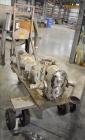 Used Waukesha 220 Positive Displacement Pump mounted on portable cart. Has a vented cover, 5
