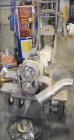 Used Waukesha 220 Positive Displacement Pump mounted on portable cart. Has a vented cover, 5